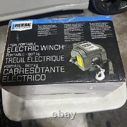 Reese Towpower Portable Electric 1 Ton Winch Steel Cable, with the wired remote